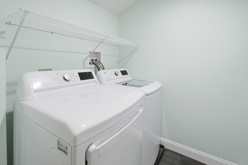 2 Turtle Lane, Unit 2 Sterling, MA 01564 - Photo 33 of 40 a utility room with dryer and washer
