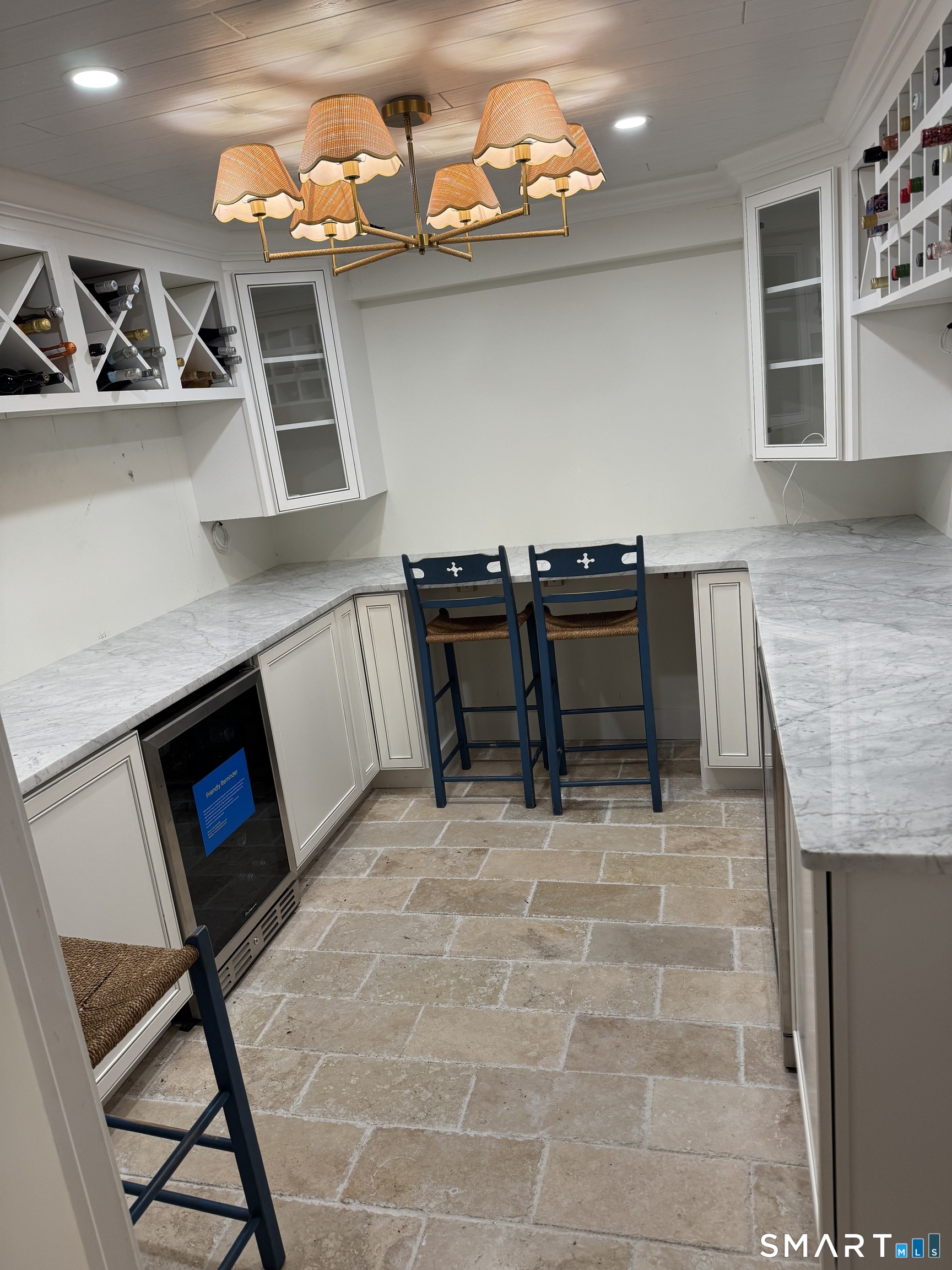 301 Old Norwalk Road New Canaan, CT 06840 - Photo 12 of 27 a living room with furniture a rug and a fireplace