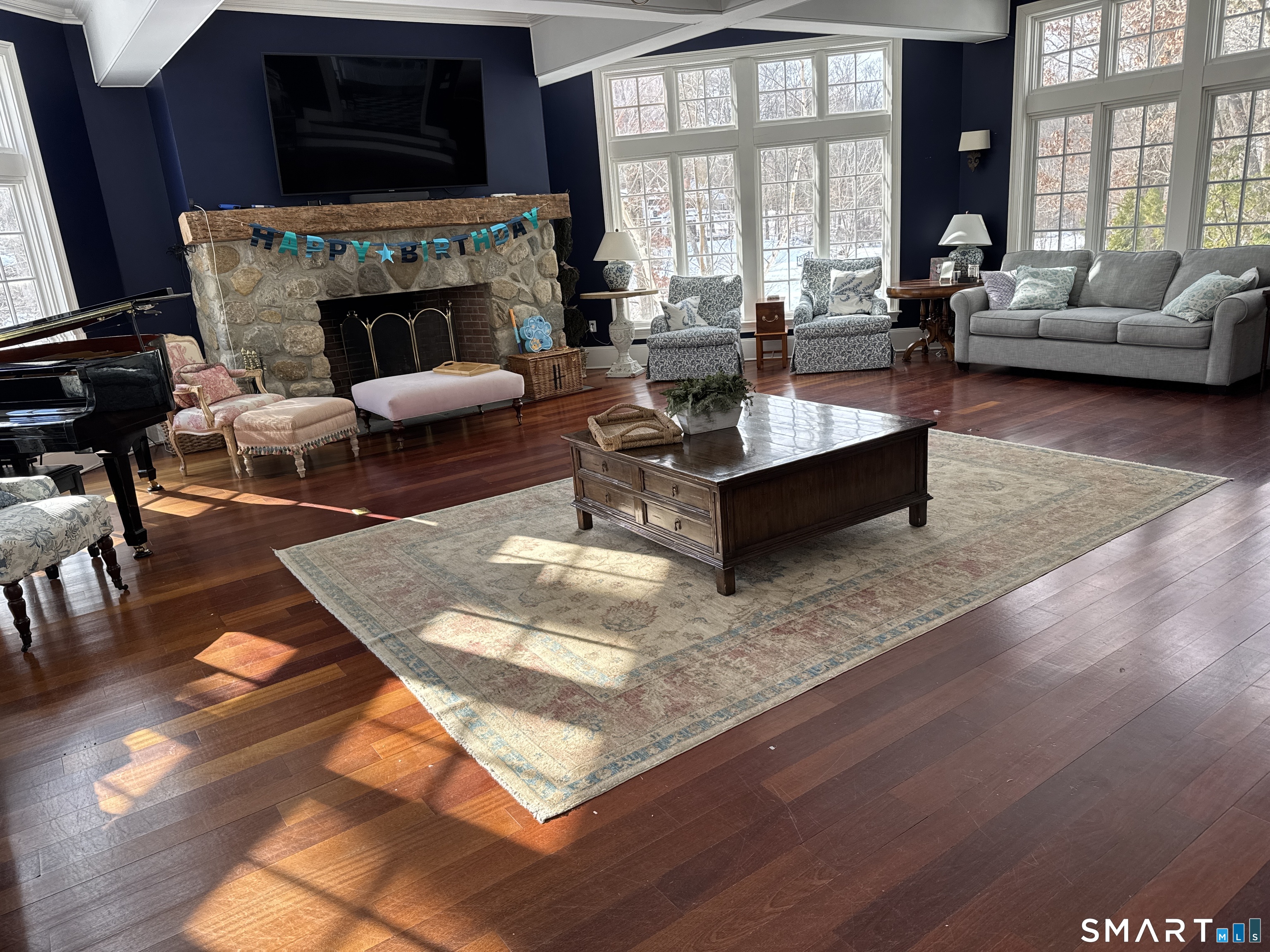 301 Old Norwalk Road New Canaan, CT 06840 - Photo 15 of 27 a living room with fireplace furniture and a large window