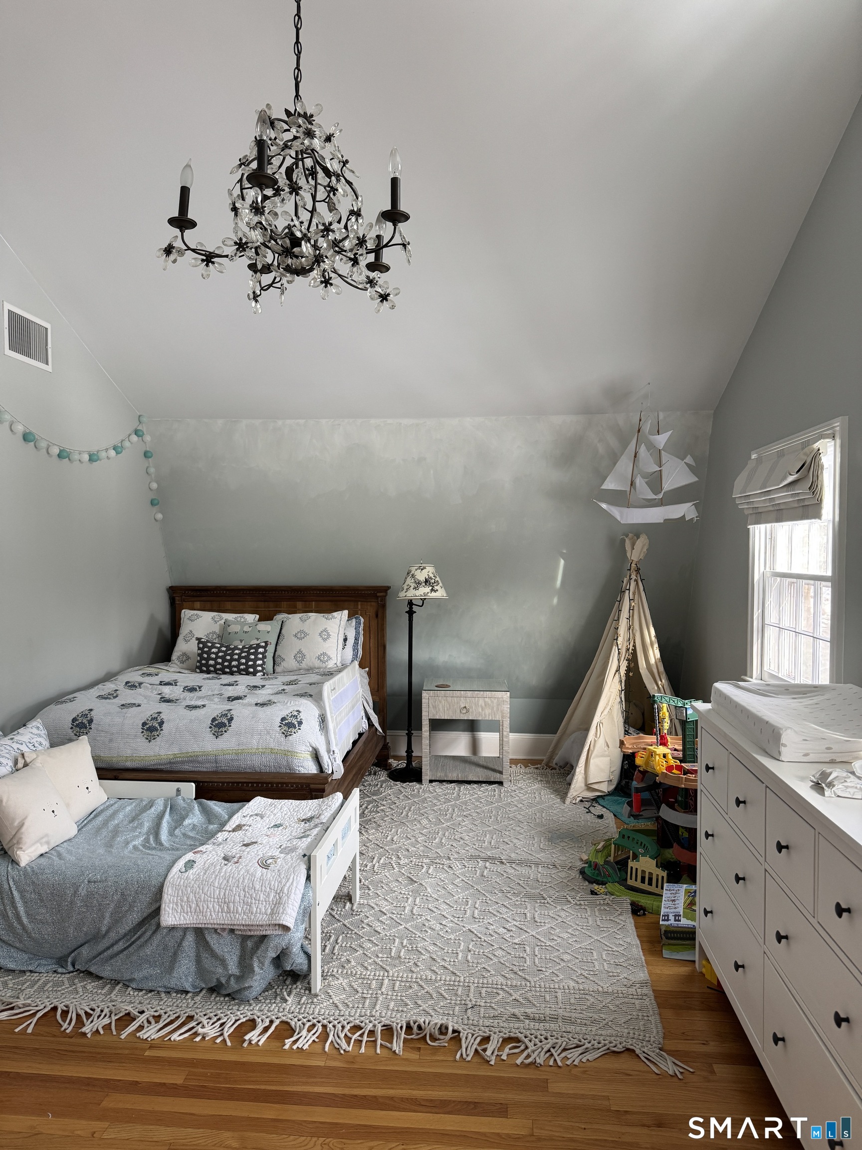 301 Old Norwalk Road New Canaan, CT 06840 - Photo 20 of 27 a bedroom with a bed and wooden floor