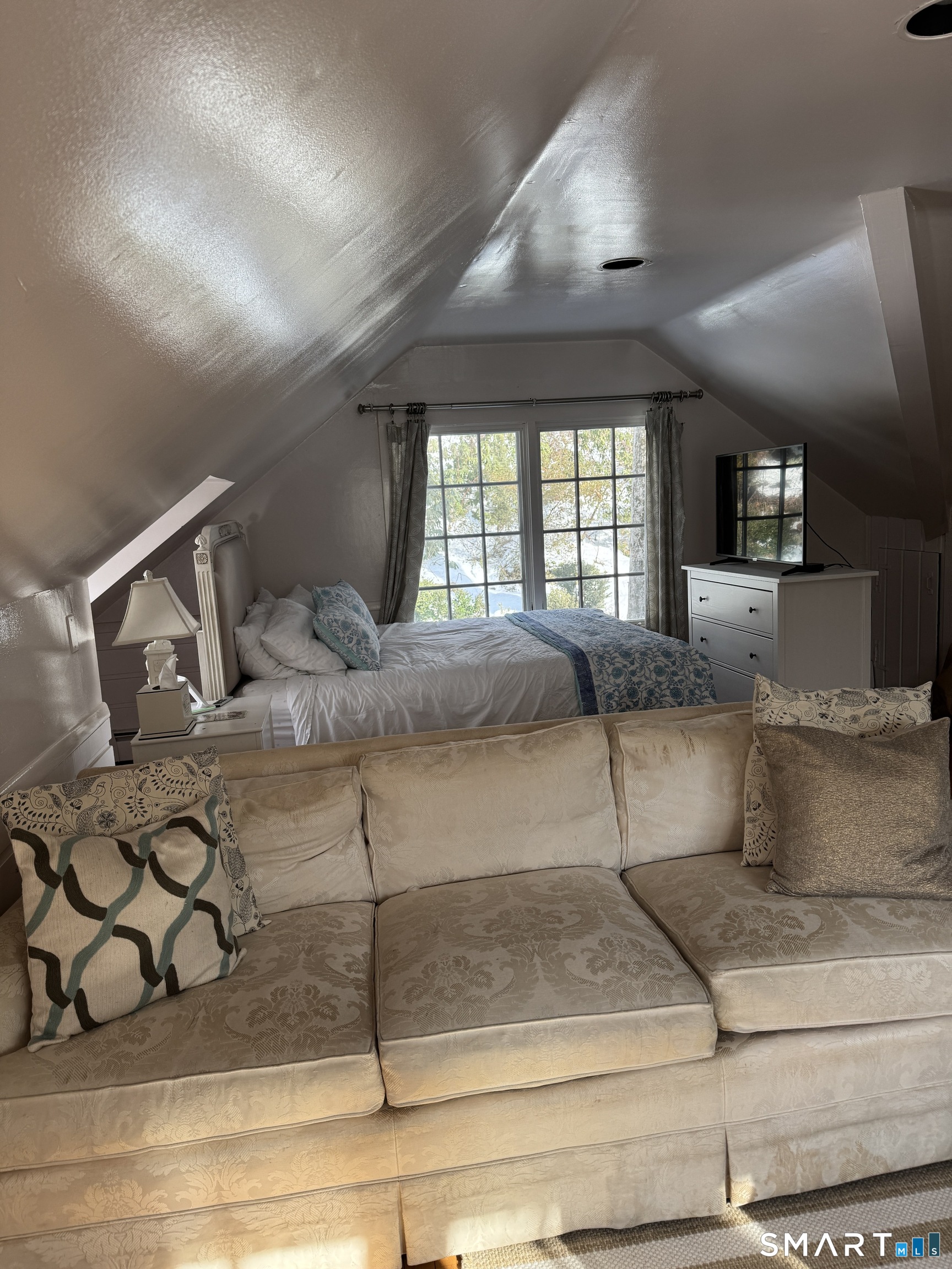 301 Old Norwalk Road New Canaan, CT 06840 - Photo 22 of 27 a living room with furniture and a large window