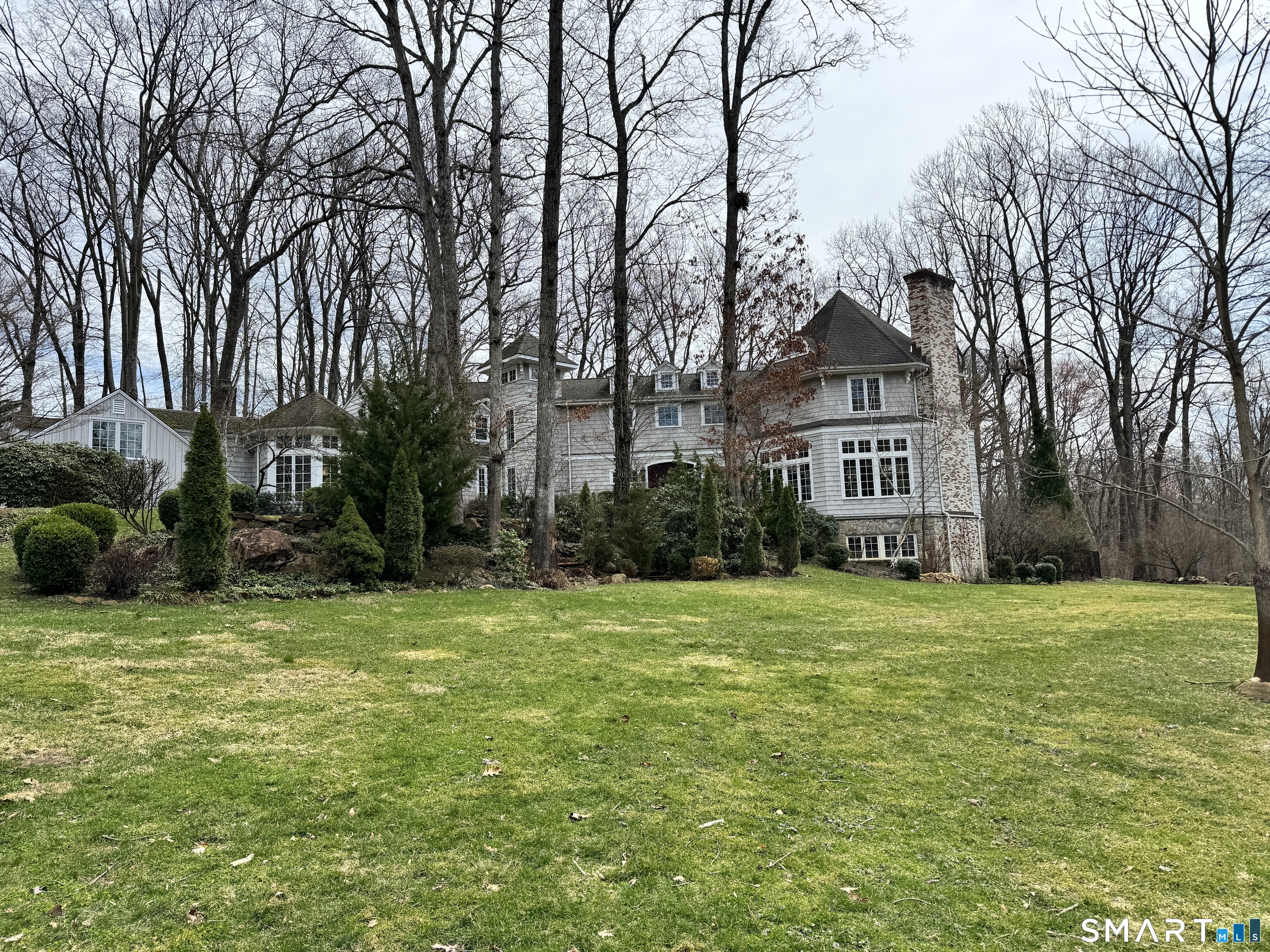 301 Old Norwalk Road New Canaan, CT 06840 - Photo 27 of 27 a view of a house with a yard