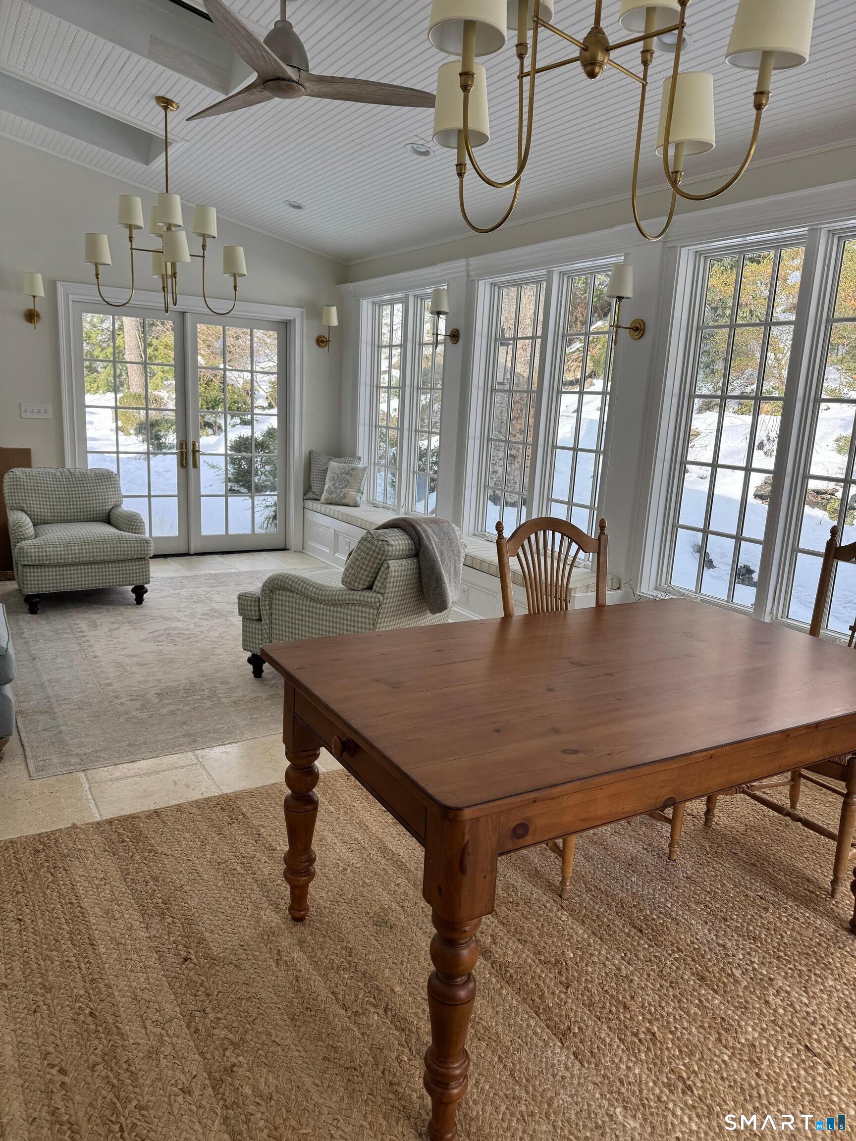301 Old Norwalk Road New Canaan, CT 06840 - Photo 4 of 27 a view of a dining room with furniture window and wooden floor