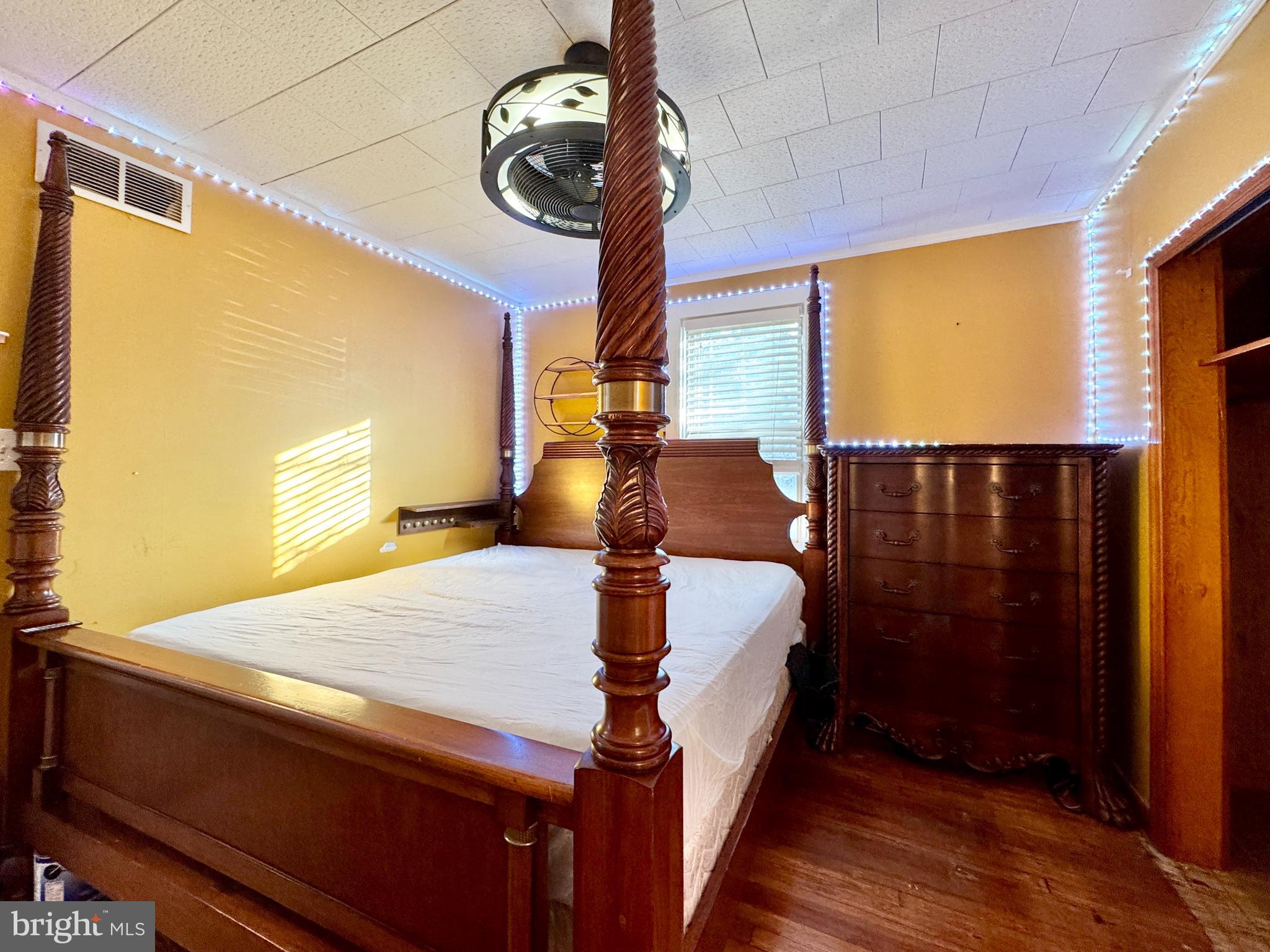 301 Linderman Avenue Cherry Hill, NJ 08002 - Photo 13 of 23 a bed room with a bed and a chandelier