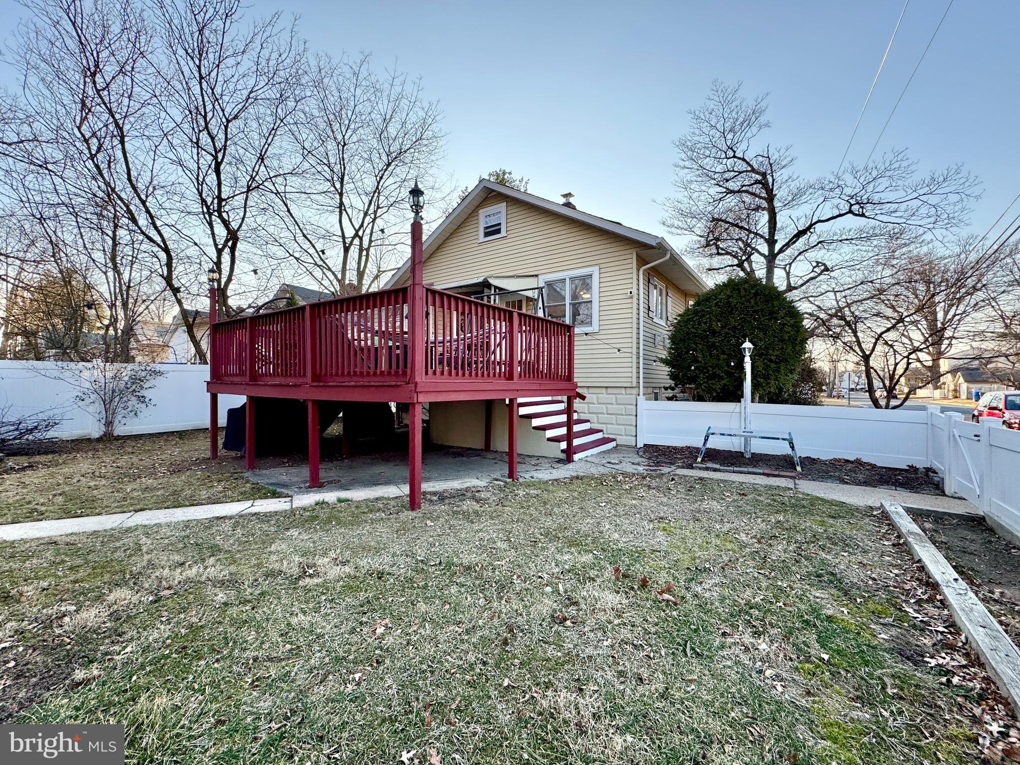 301 Linderman Avenue Cherry Hill, NJ 08002 - Photo 20 of 23 a view of a house with a yard and deck