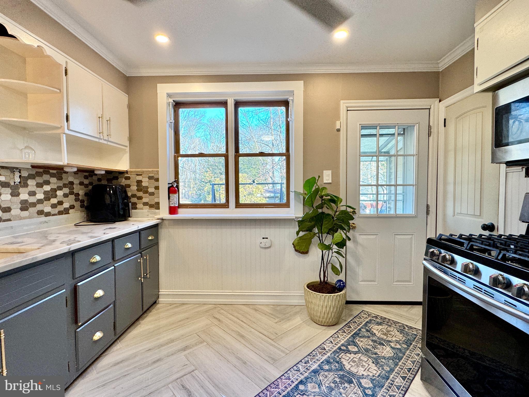 301 Linderman Avenue Cherry Hill, NJ 08002 - Photo 8 of 23 a kitchen with a stove and a sink