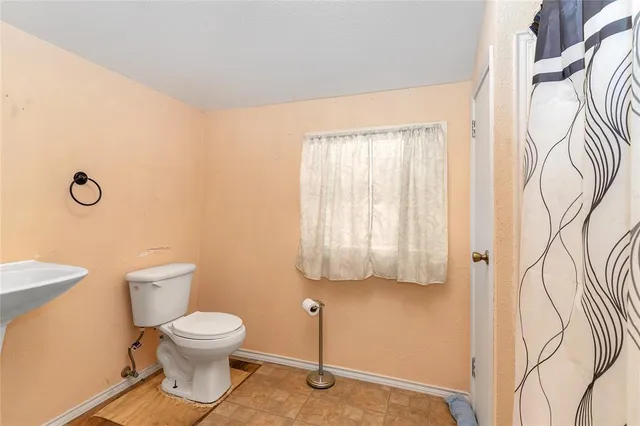 a room with toys and wooden floors