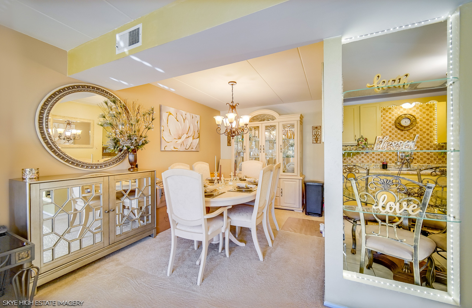 18855 Burnham Avenue, Unit 234 Lansing, IL 60438 - Photo 9 of 19 a view of a dining room with furniture and a chandelier