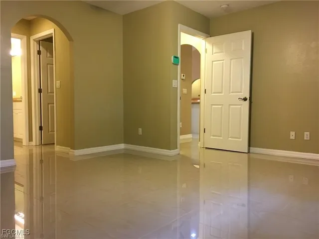 a view of a bathroom from a hallway