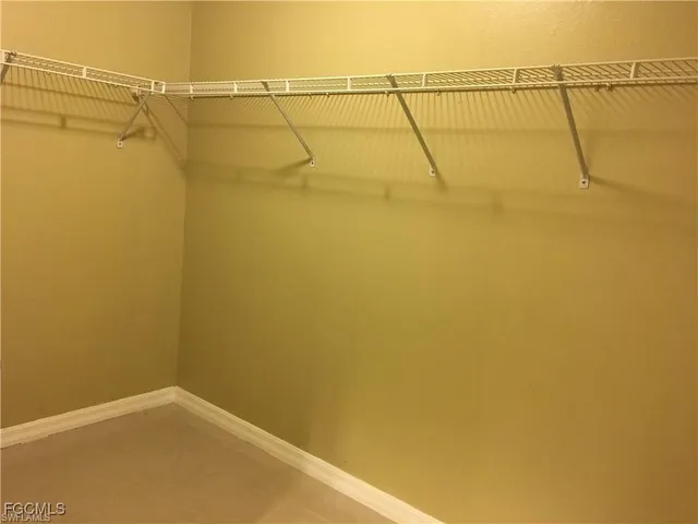 a view of hallway with livingroom