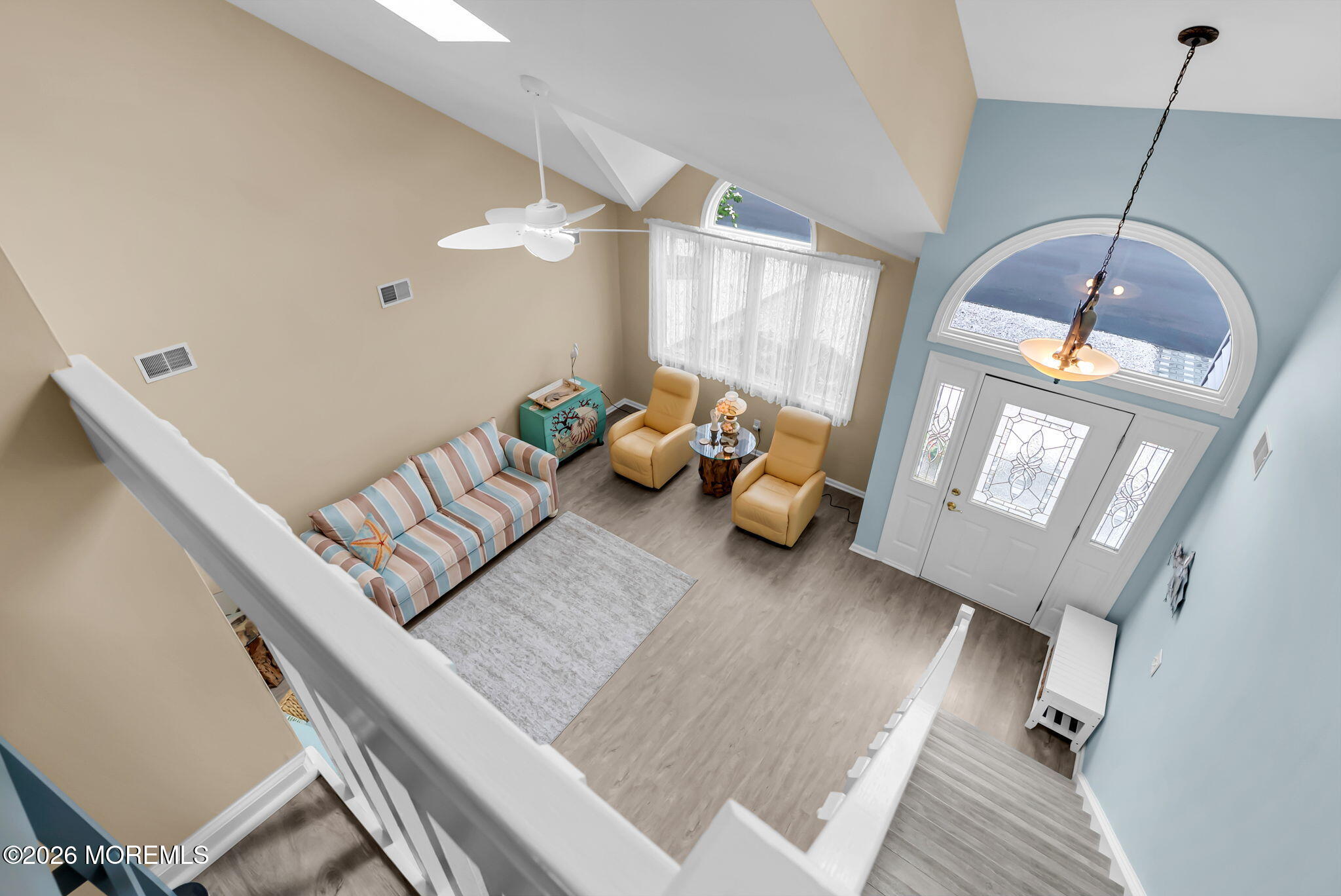 9 Cross Trees Road Brick, NJ 08723 - Photo 46 of 126 a living room with furniture and a chandelier