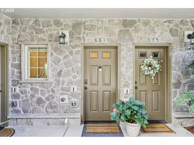 a view of a door and an outdoor space with seating space