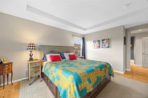 a bedroom with a bed and a table in it