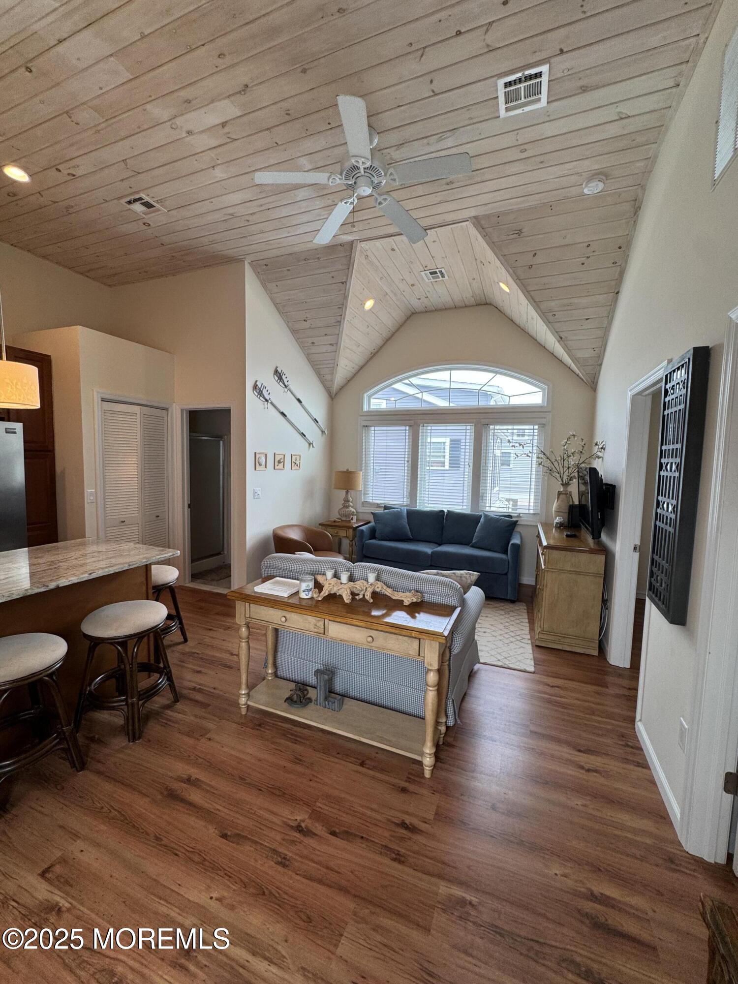 29 East Dune Way Lavallette, NJ 08735 - Photo 5 of 9 a living room with furniture and a flat screen tv