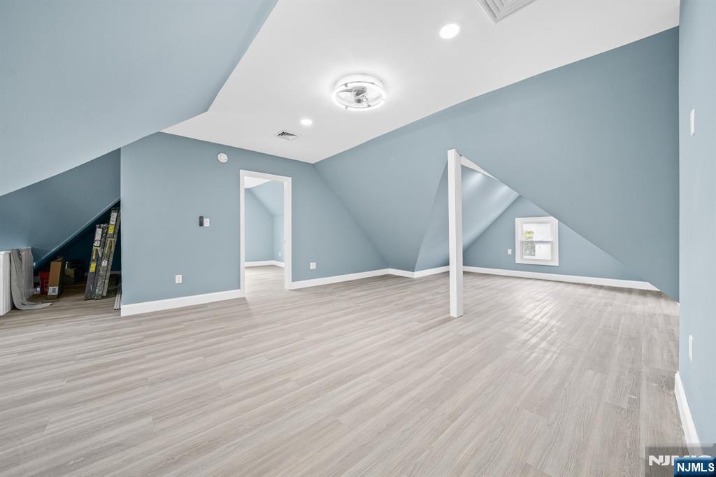 137 Prospect Place Rutherford, NJ 07070 - Photo 14 of 19 a view of a livingroom with wooden floor