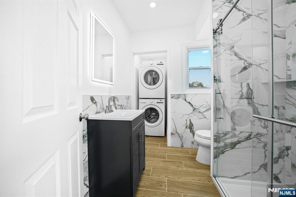 137 Prospect Place Rutherford, NJ 07070 - Photo 7 of 19 a bathroom with a sink and a mirror