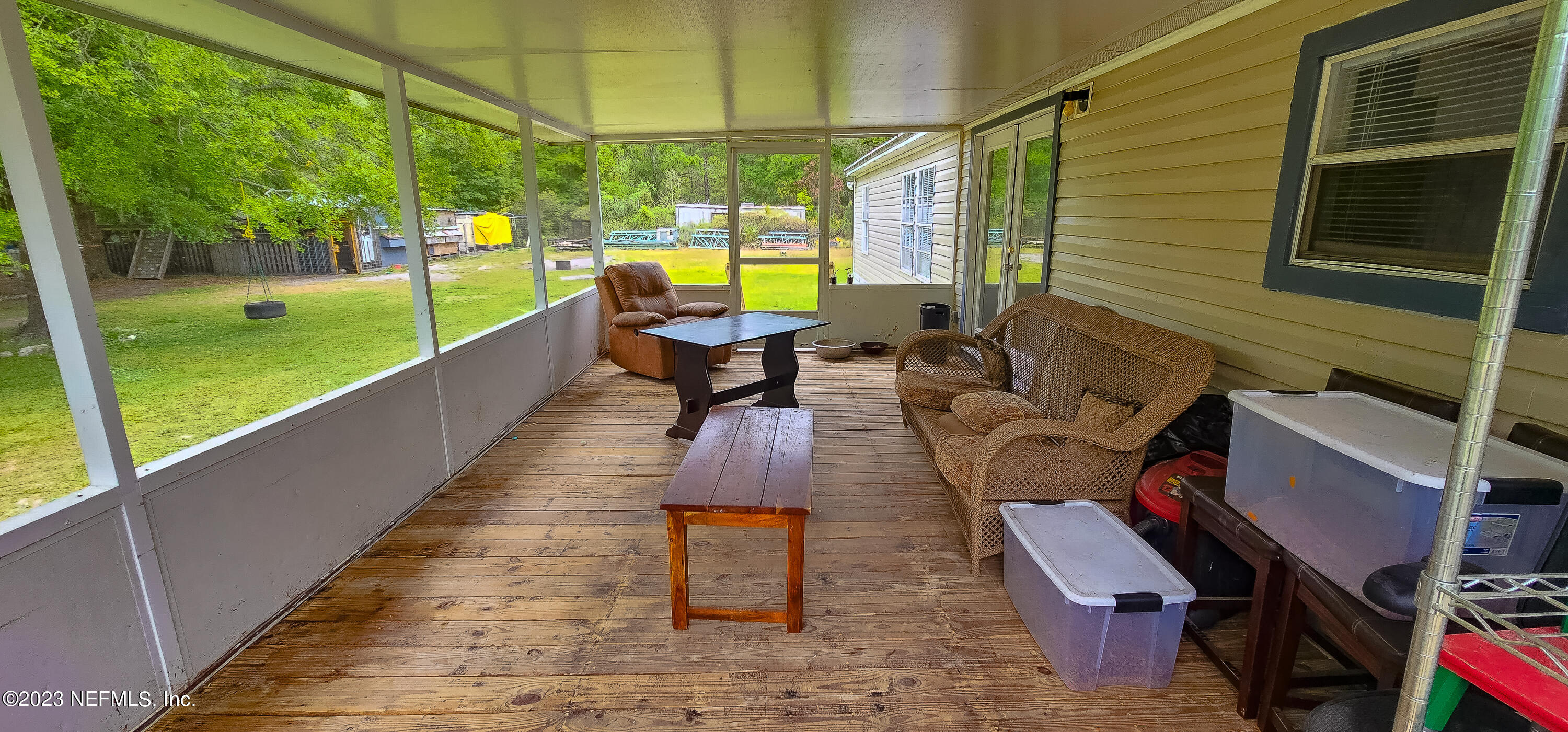 37168 Abercorn Road Hilliard, FL 32046 - Photo 16 of 25 Screened Back Deck