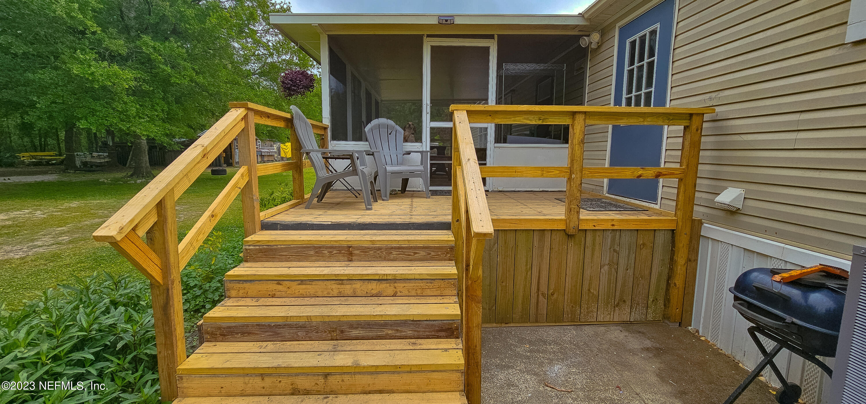 37168 Abercorn Road Hilliard, FL 32046 - Photo 23 of 25 Back Porch sitting area