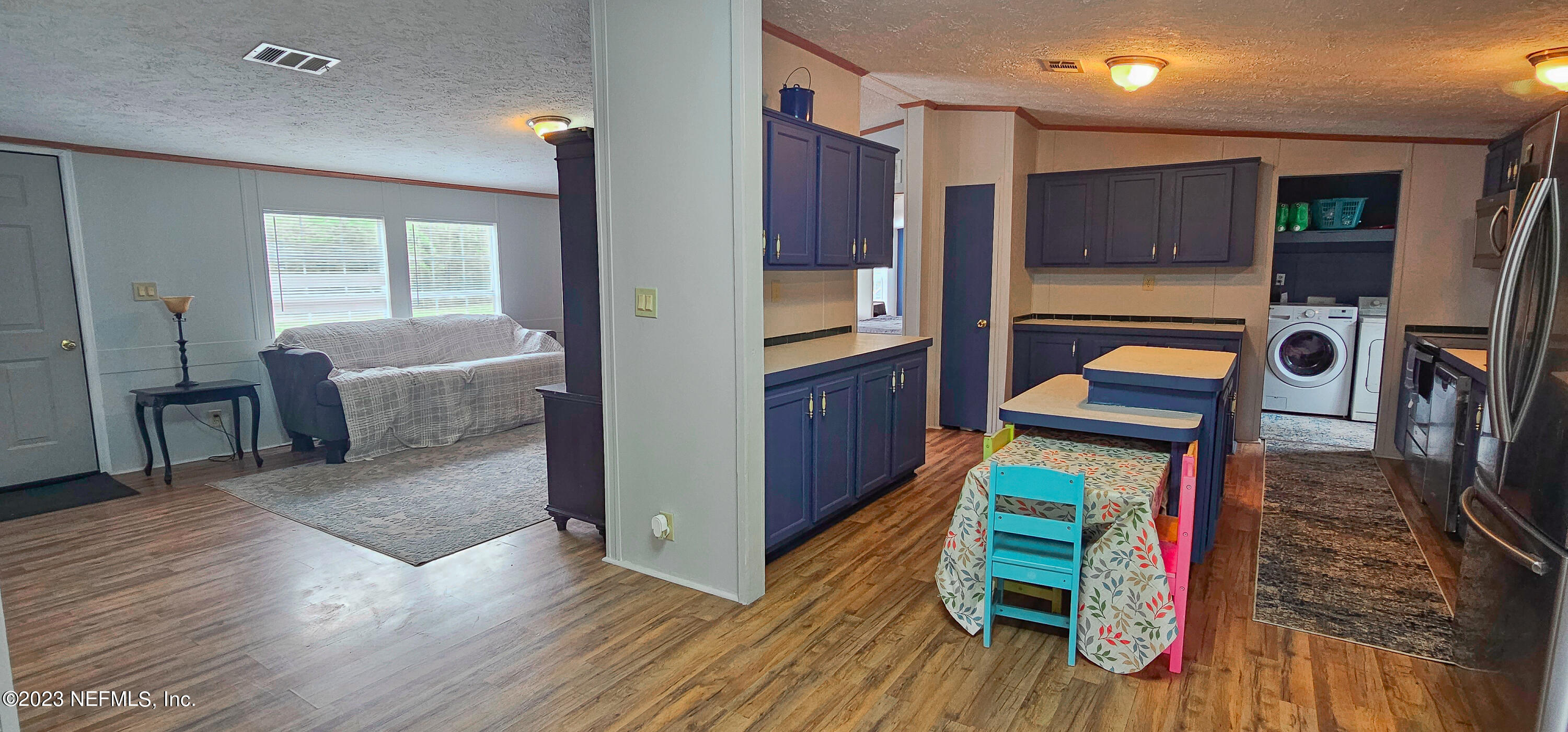 37168 Abercorn Road Hilliard, FL 32046 - Photo 7 of 25 Kitchen - Living room areas