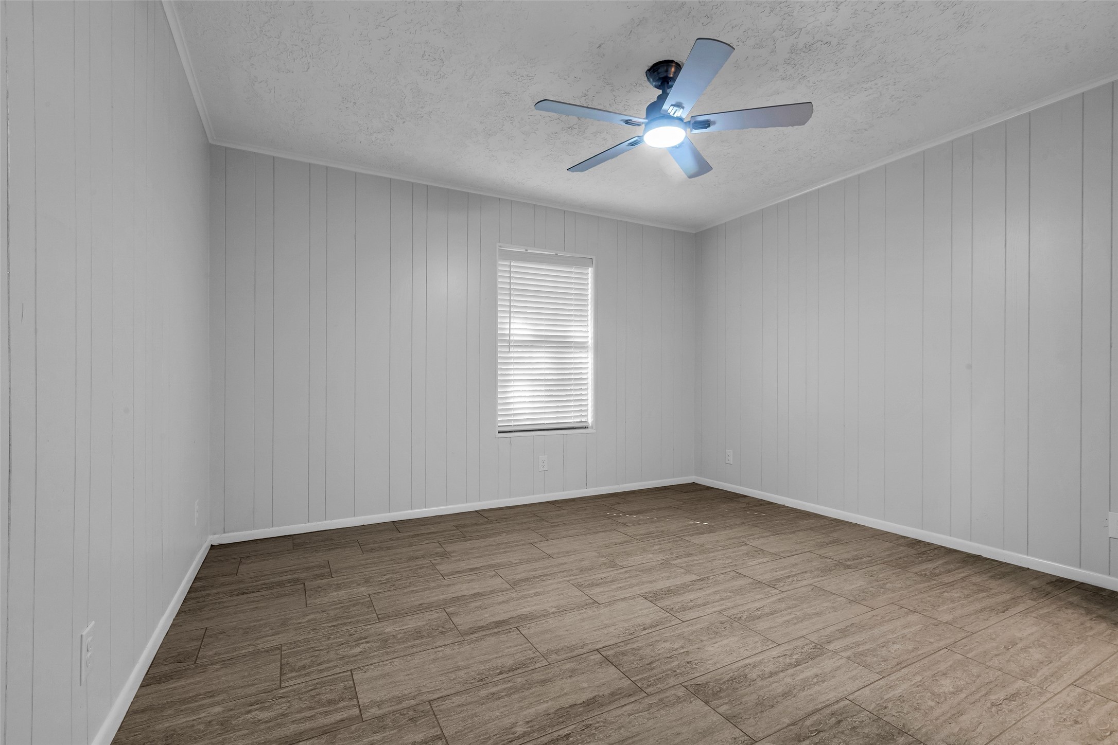 23311 Nichols Sawmill Road Hockley, TX 77447 - Photo 15 of 23 wooden floor in an empty room with a window