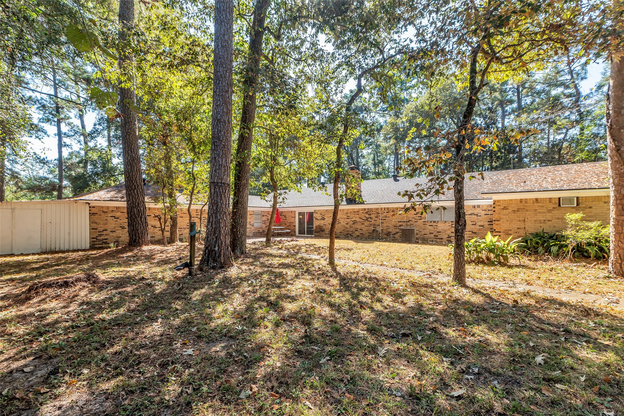 23311 Nichols Sawmill Road Hockley, TX 77447 - Photo 21 of 23 a view of a yard with trees