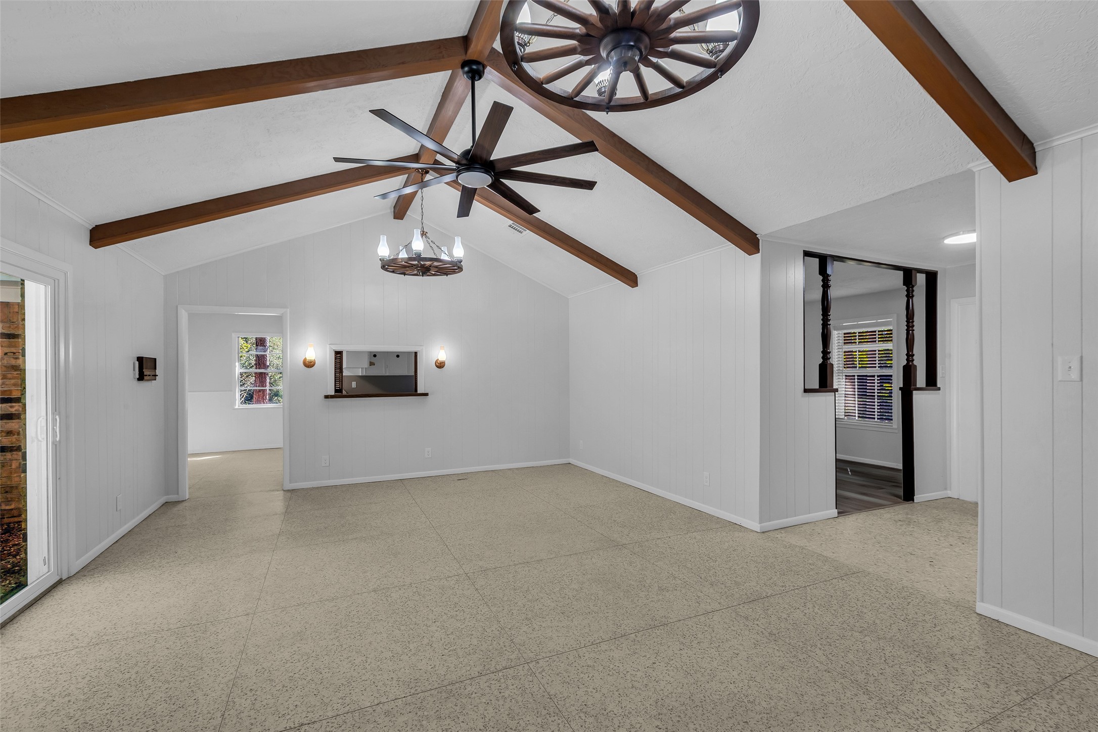 23311 Nichols Sawmill Road Hockley, TX 77447 - Photo 3 of 23 a view of a livingroom with a ceiling fan and window