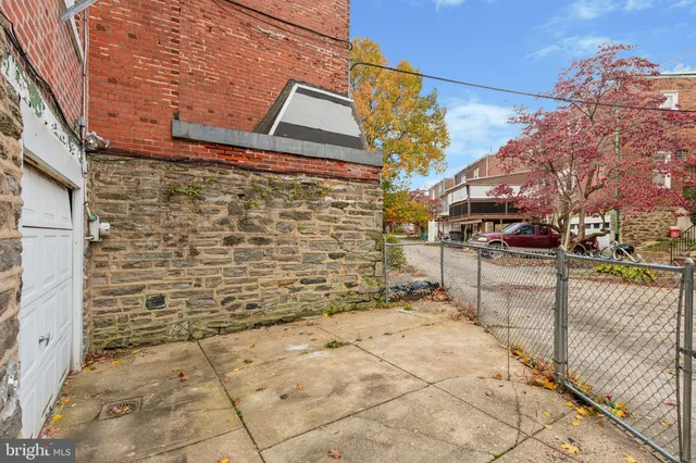 a view of a yard with some trees