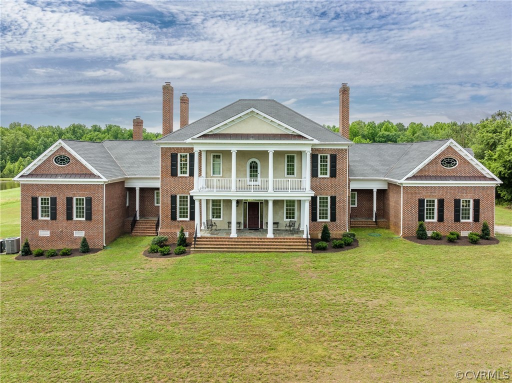 2190 Manakin Road Manakin-Sabot, VA 23103 - Photo 1 of 31 a front view of a house with a yard