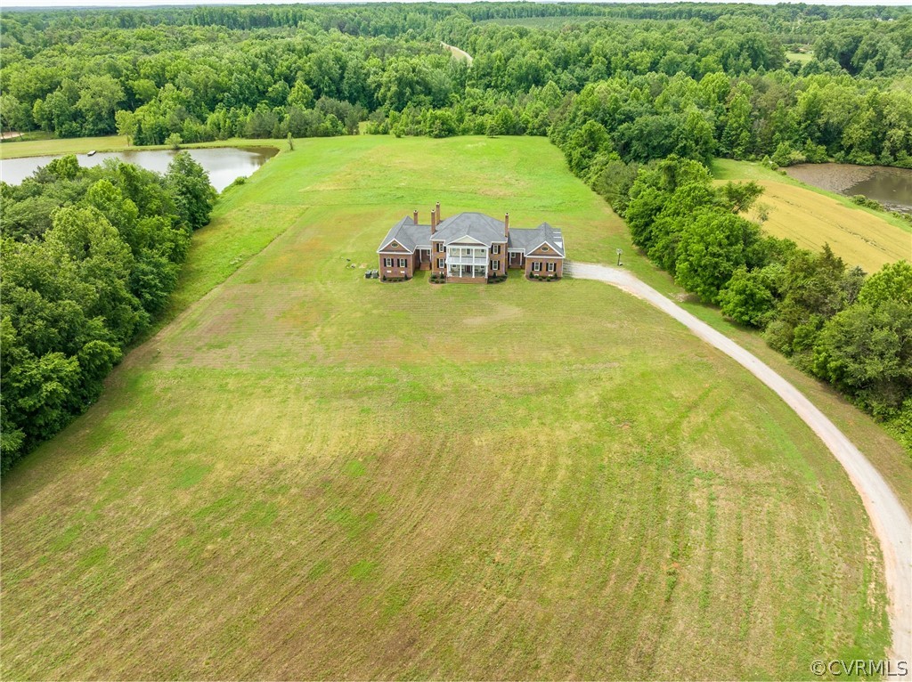 2190 Manakin Road Manakin-Sabot, VA 23103 - Photo 2 of 31 a view of a swimming pool and trees in the background