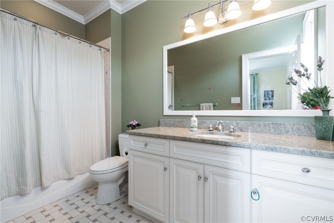2190 Manakin Road Manakin-Sabot, VA 23103 - Photo 26 of 31 a bathroom with a granite countertop sink a toilet and a mirror