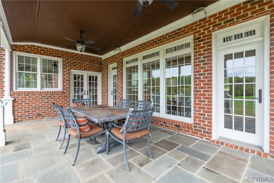 2190 Manakin Road Manakin-Sabot, VA 23103 - Photo 29 of 31 a view of a patio with a table and chairs