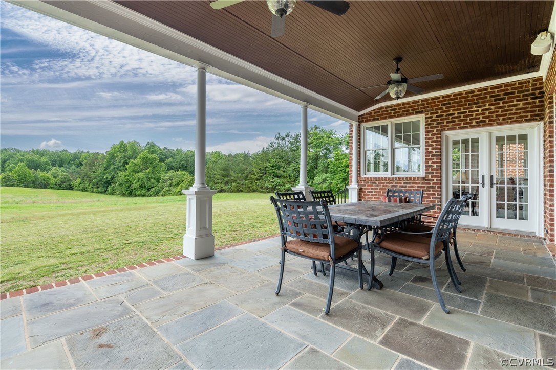 2190 Manakin Road Manakin-Sabot, VA 23103 - Photo 30 of 31 a patio with table and chairs and potted plants