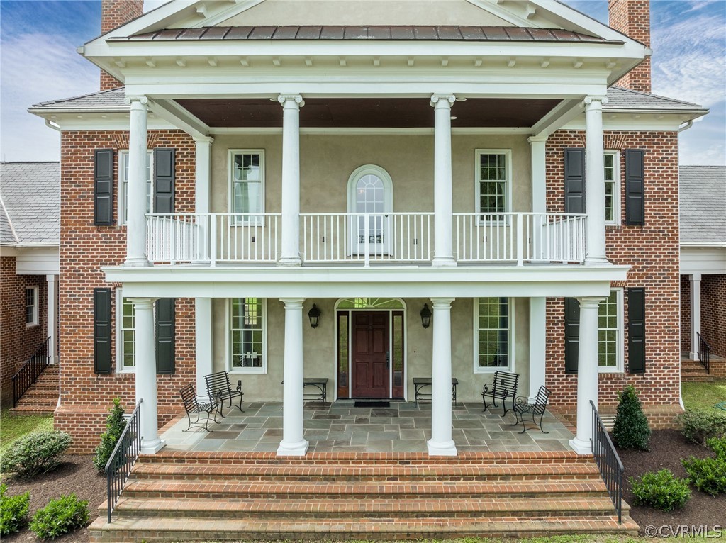 2190 Manakin Road Manakin-Sabot, VA 23103 - Photo 3 of 31 a front view of a house with porch and windows