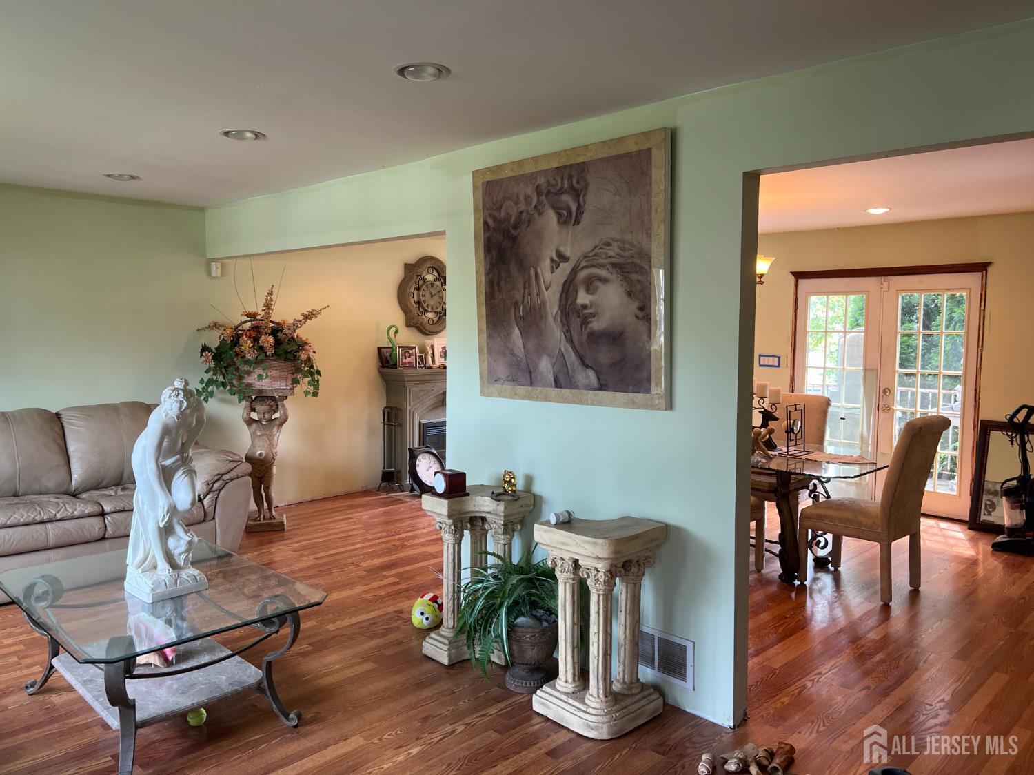 105 Howard Avenue Edison, NJ 08837 - Photo 14 of 39 a view of a livingroom with furniture and a potted plant