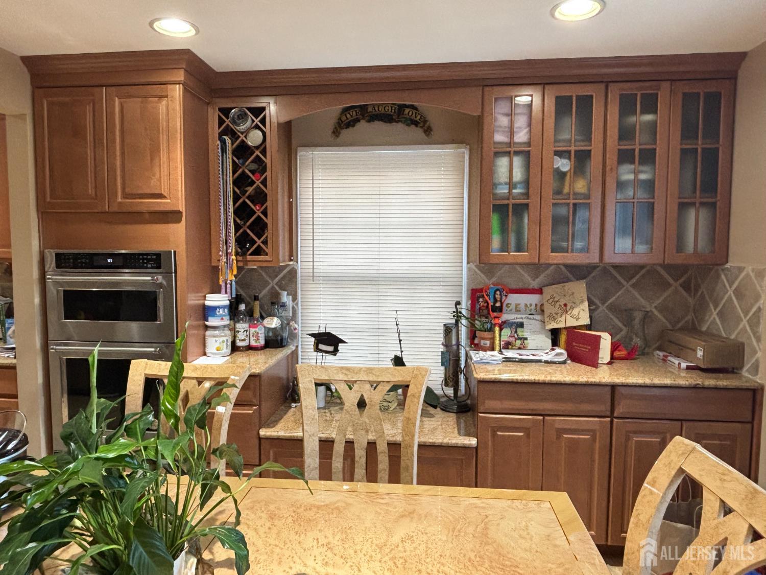 105 Howard Avenue Edison, NJ 08837 - Photo 19 of 39 a kitchen with a sink stove and cabinets