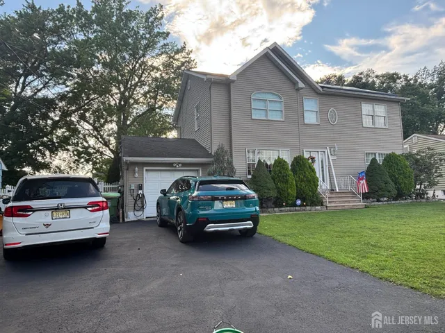 a car parked in front of a house