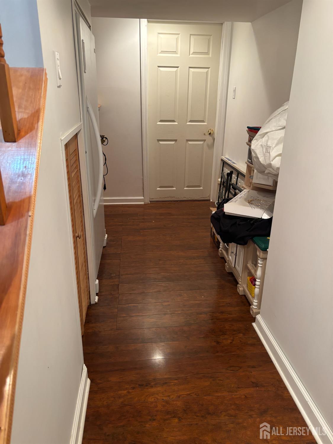 105 Howard Avenue Edison, NJ 08837 - Photo 36 of 39 a view of a livingroom with furniture and hardwood floor