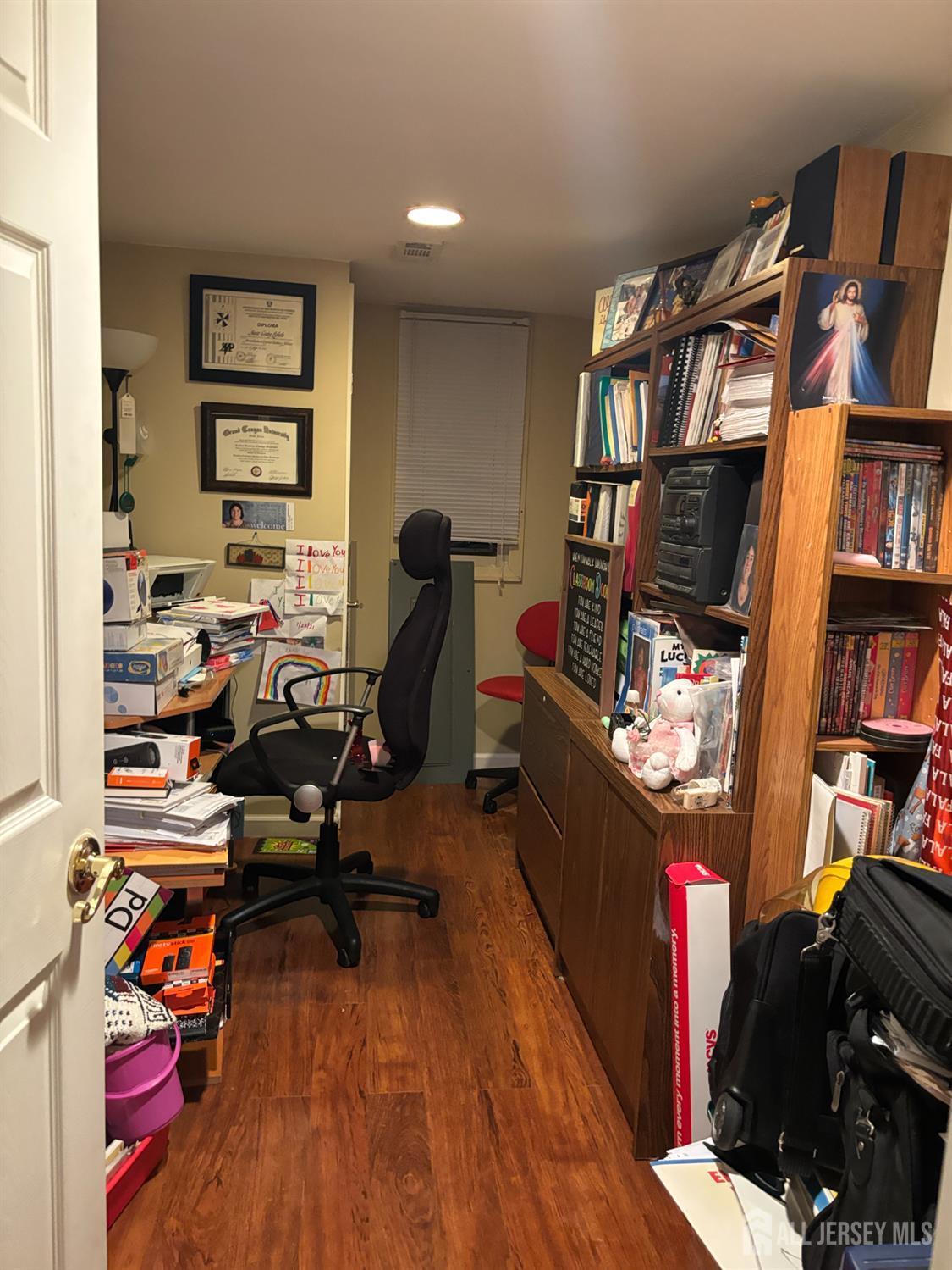 105 Howard Avenue Edison, NJ 08837 - Photo 37 of 39 a view of a workspace with furniture and toys