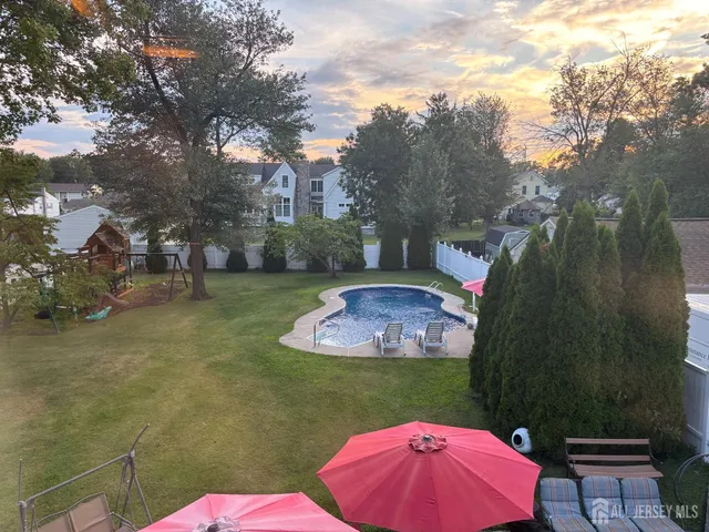 a garden view with a seating space