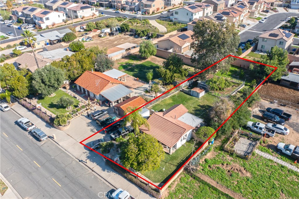 825 South Acacia Avenue Rialto, CA 92376 - Photo 5 of 8 an aerial view of residential houses with outdoor space