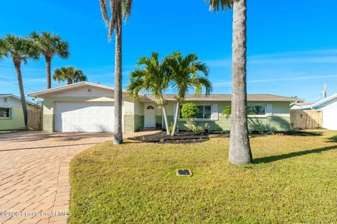 a view of a house with a swimming pool