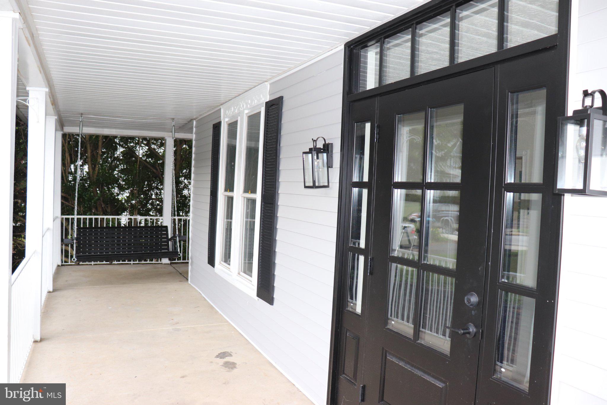 529 Main Street Delta, PA 17314 - Photo 3 of 24 Charming porch with inviting entryway.