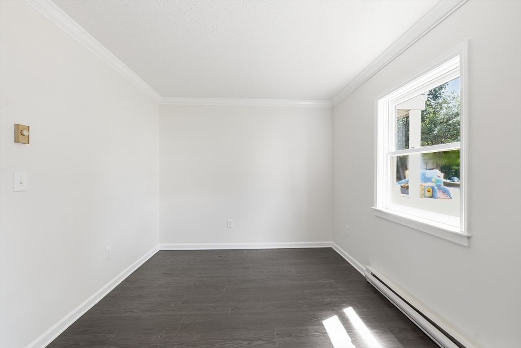 30 Abbey Road, Unit 102 Leominster, MA 01453 - Photo 13 of 15 an empty room with a window