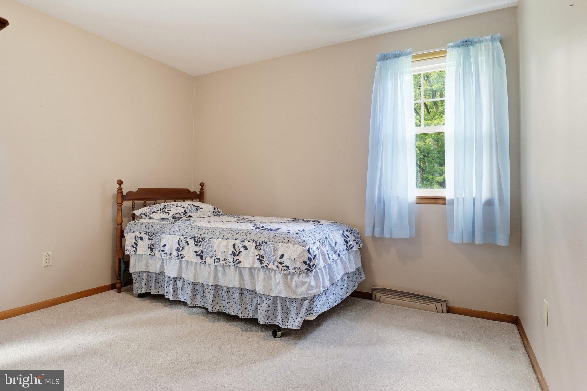 498 Middletown Road Hummelstown, PA 17036 - Photo 17 of 39 Serene bedroom with natural light.