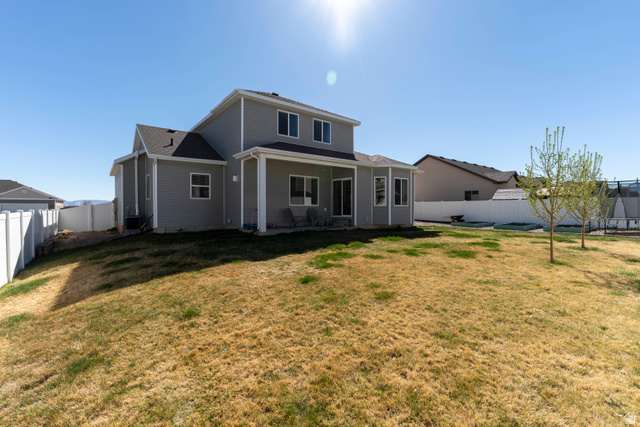 836 South 250 West Vernal, UT 84078 - Photo 47 of 56 Back of house with a patio and a fenced backyard