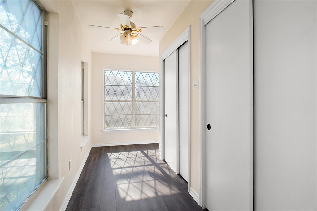 221 West 5th Street Springtown, TX 76082 - Photo 14 of 20 a view of an entryway with a chandelier