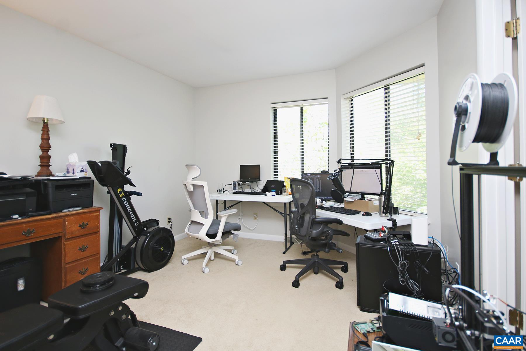 1225 Chatham Ridge Charlottesville, VA 22901 - Photo 14 of 16 a view of a workspace with furniture and a window