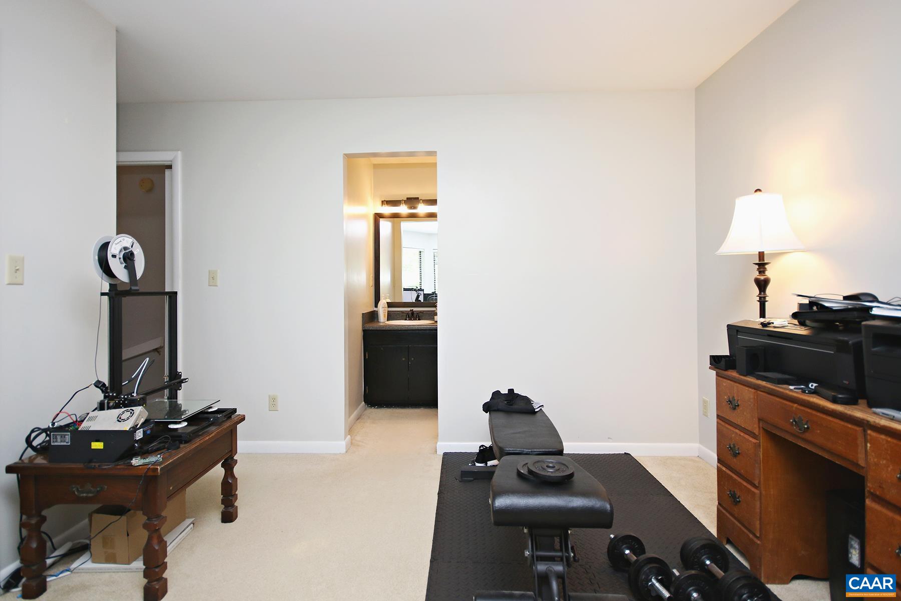 1225 Chatham Ridge Charlottesville, VA 22901 - Photo 15 of 16 a living room with furniture and wooden floor