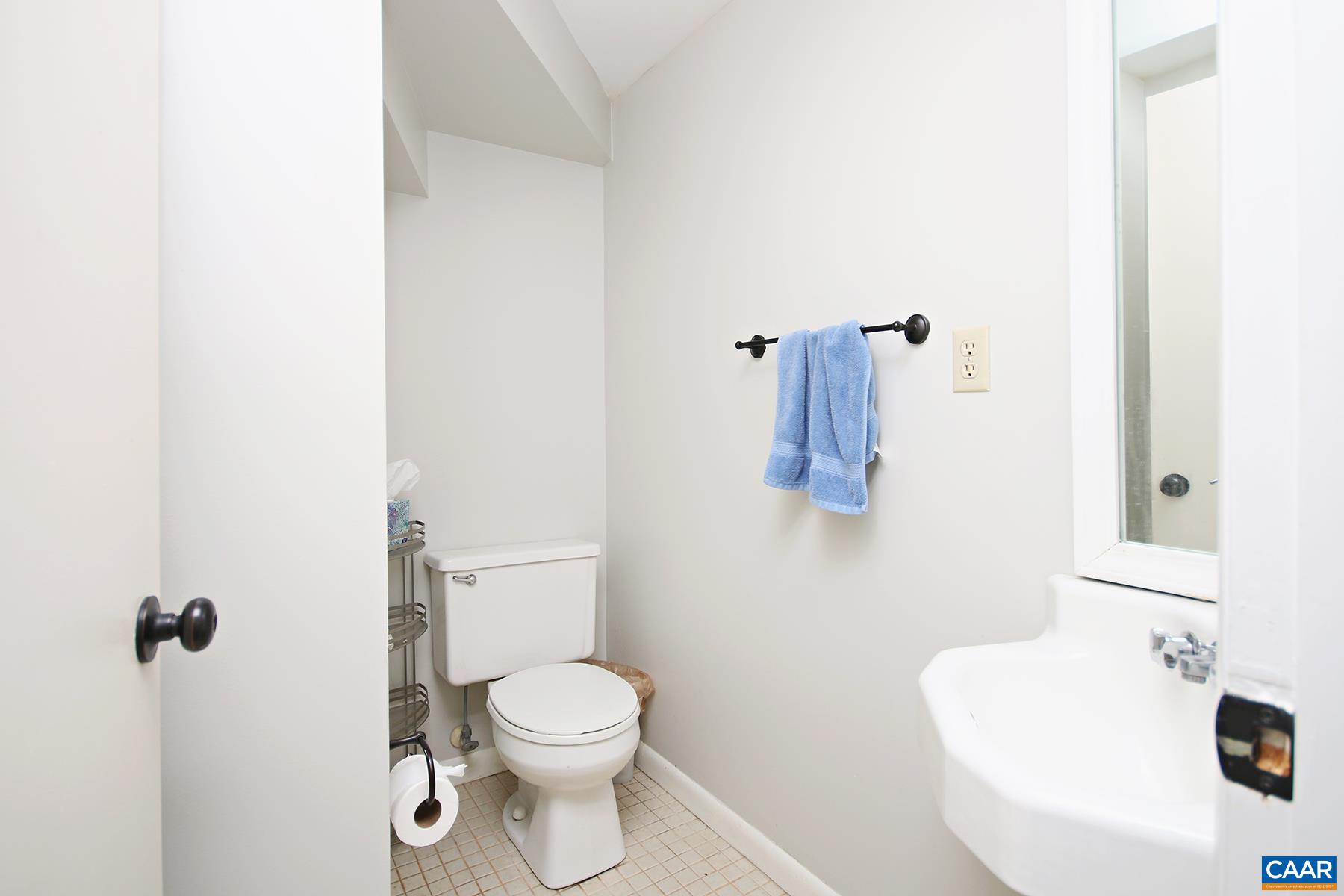 1225 Chatham Ridge Charlottesville, VA 22901 - Photo 10 of 16 a white toilet sitting next to a bathroom sink