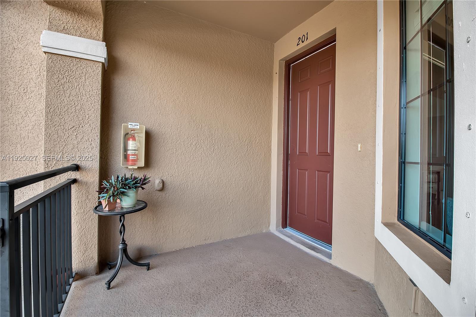 13608 Messina Loop, Unit 201 Bradenton, FL 34211 - Photo 2 of 68 a view of a hallway with a elevator